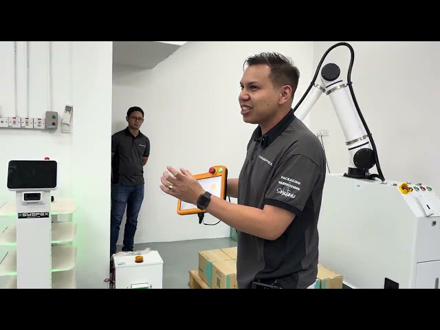 Explanation and simulation of robotic arm applications in warehouse operations.