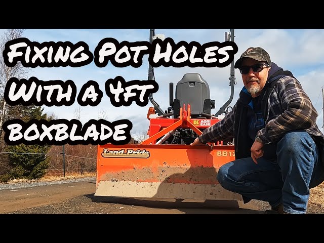 How to grade and fix pot holes with a 4ft box blade on a sub compact tractor