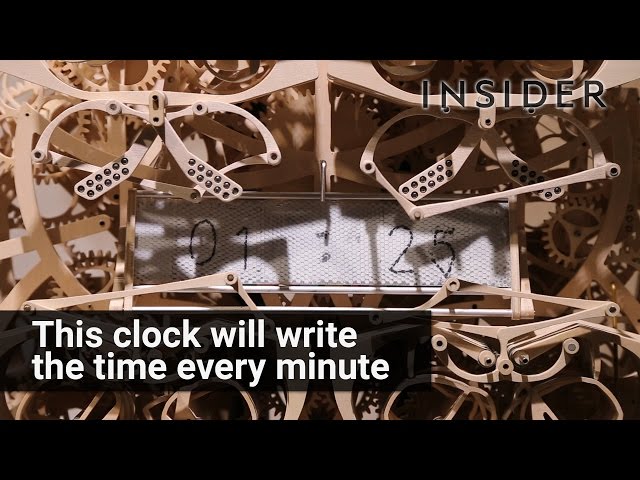 This clock writes the time