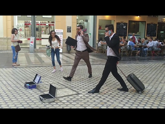 Human statue: 2 businessmen - Malaga Center, Spain