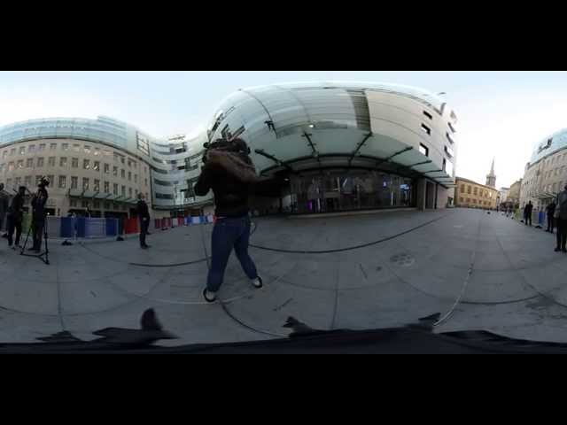 360 - Spiderman Alain Robert climbs BBC building.