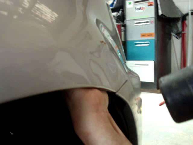 Dents reversed - panelbeating on a fold or swage .