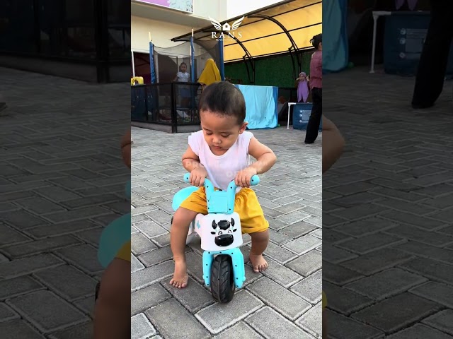 Falah Embul rides a bicycle