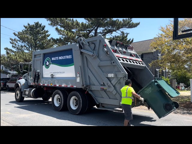 Waste Industries Peterbilt Heil Powertrak rear loader garbage truck
