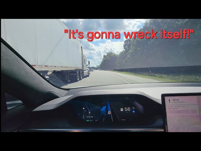 Tesla FSD first try. Almost wrecked immediately.