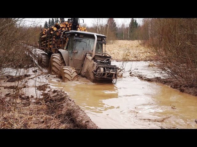 Valtra forestry tractor logging in wet conditions