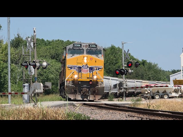 [4K] SB Heavy UP grain train crosses the busy diamonds at Paola! 