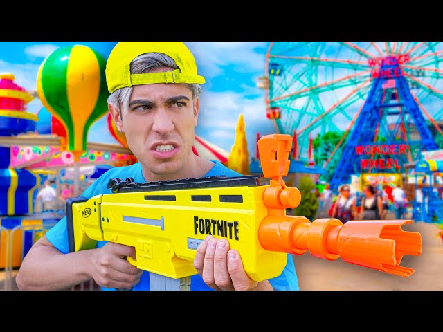 BATALLA DE NERF EN PARQUE DE DIVERSIONES !!